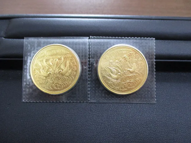 天皇陛下御在位60年記念10万円金貨