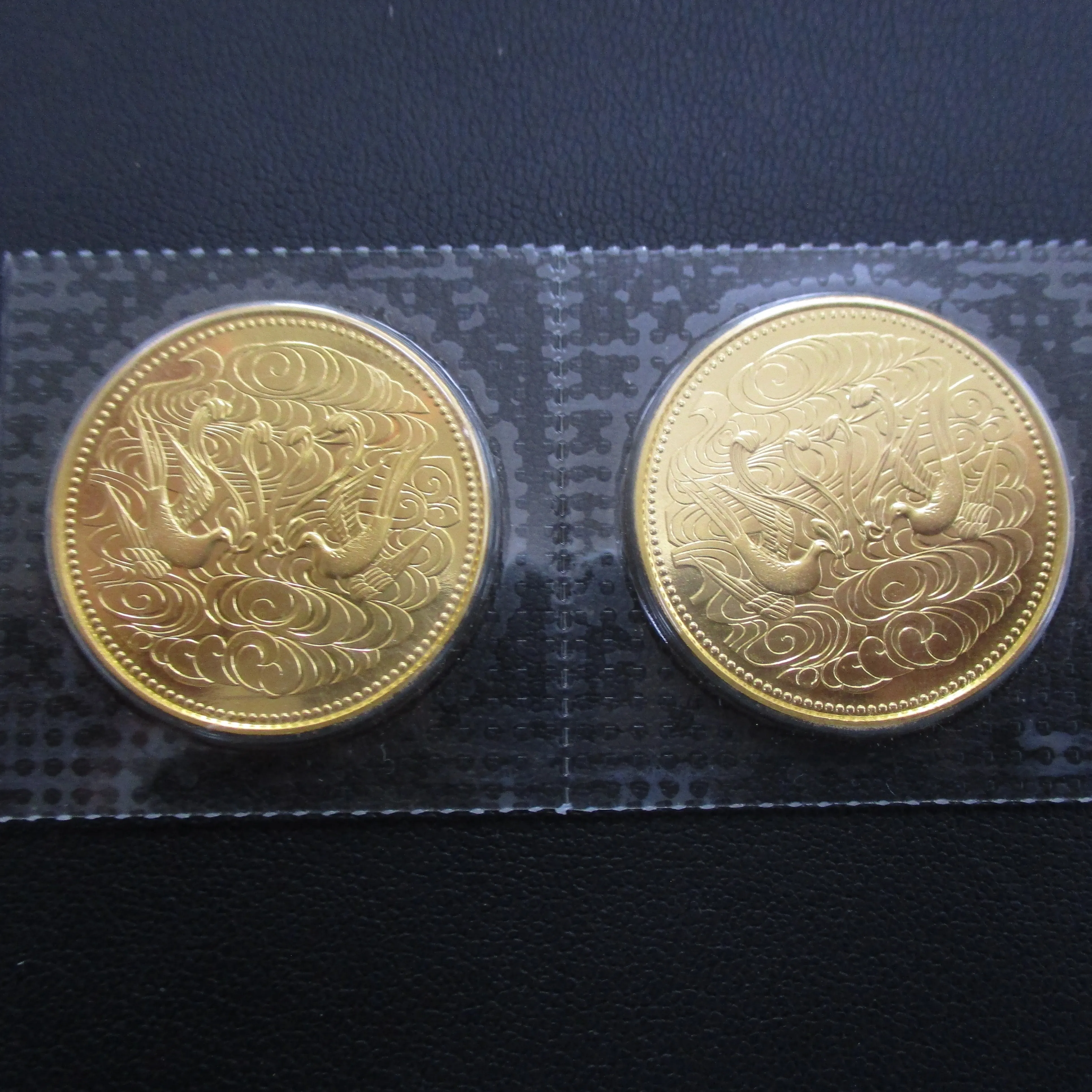 天皇陛下御在位60年記念10万円金貨